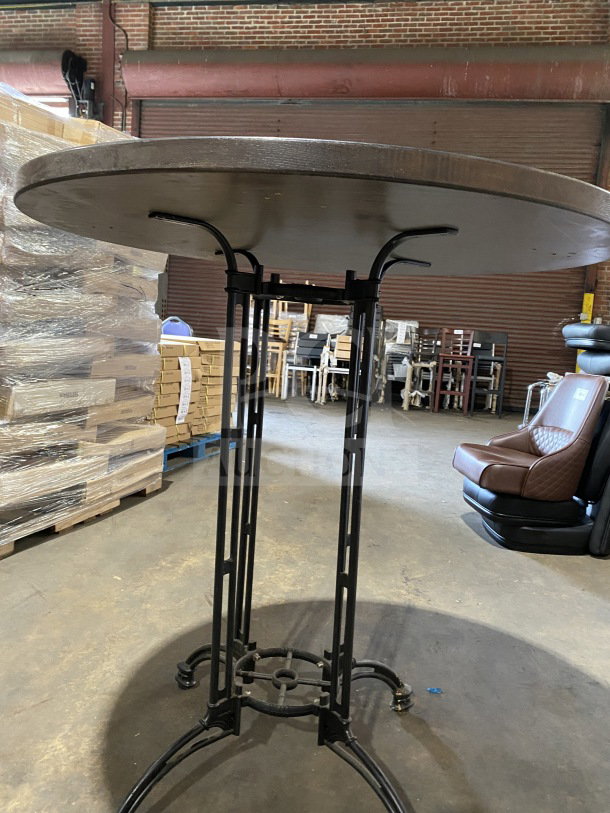 Brand new 42" round composite bar height table, ideal for indoor/outdoor use, black metal base, pristine condition.