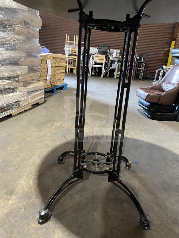 Brand new 42" round composite bar height table, suitable for indoor/outdoor use. Black metal base, sturdy design.
