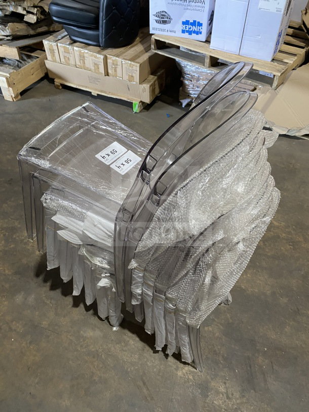BRAND NEW GA Commercial Ghost Transparent Polycarbonate Stackable Side Chair, oval back, wrapped in protective packaging.