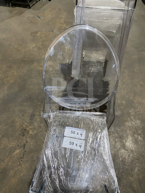 BRAND NEW GA transparent polycarbonate stackable side chair, oval back, indoor/outdoor use. Tags show auction info.