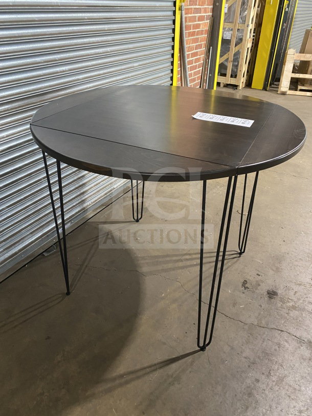 Brand new 42" round composite bar-height table with hairpin legs for indoor/outdoor use, black finish.