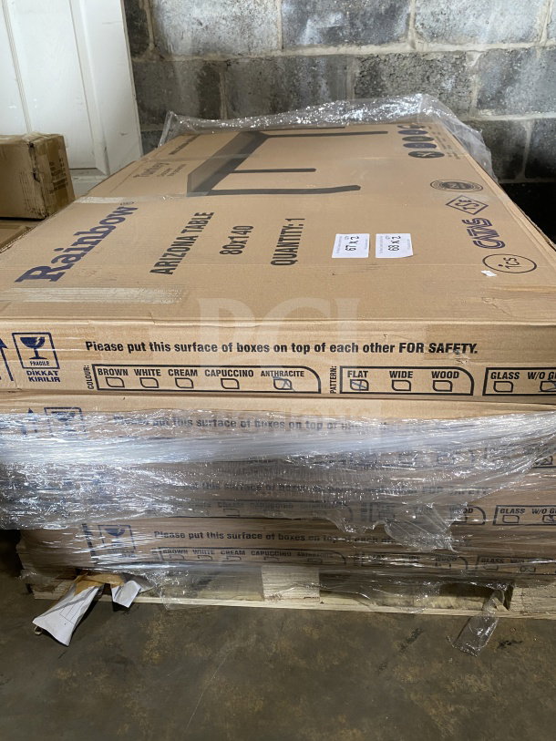 Brand new Rainbow Arizona Table in packaging. Heavy-duty dark brown rattan, 80x140 cm. Model: Arizona Table.