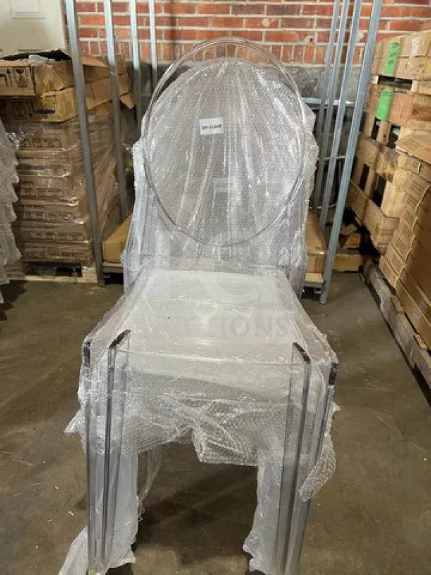 Brand new GA Commercial Ghost Chair, transparent polycarbonate, oval back, stackable. Protective wrap visible.