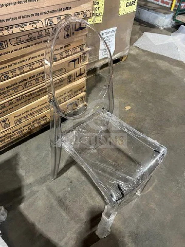 BRAND NEW GA Ghost transparent polycarbonate stackable side chair, oval back, for indoor/outdoor use, protective wrap.
