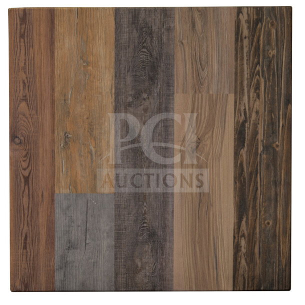 BRAND NEW OCS Barn Plank 30x48" bar height table with polished base; textured wood design; unused in original packaging.