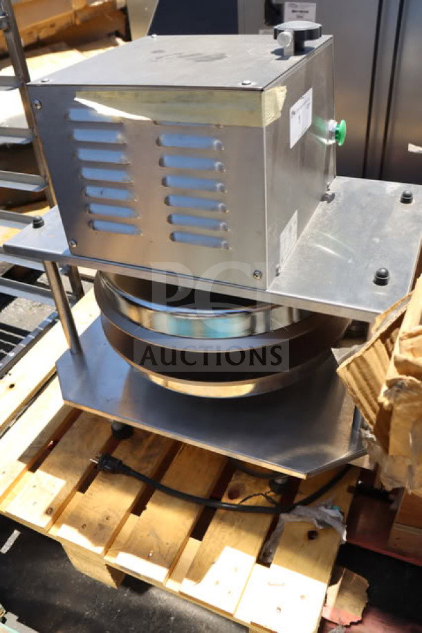 Brand new Somerset SEP-760 18" dough press on pallet, 220V, 3600W, S/N: 2506R0007, with minor scratches, in stainless steel.