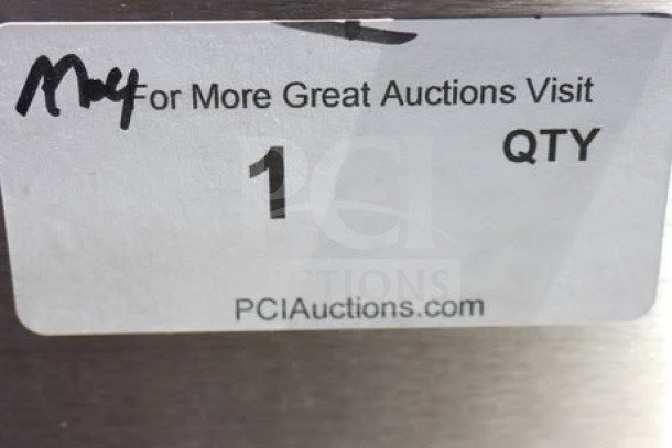 Alt text: Auction label on Somerset SEP-760 dough press indicating item quantity of 1 and auction website information.