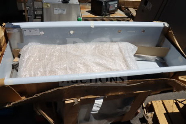 Regency 600FHDMS1848 48" x 17.5" hand sink for 8" center faucets, mint condition, visible scratch-n-dent packaging.