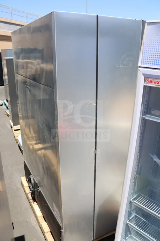 Brand new True T-49DT-HC combination refrigerator/freezer, 54 1/8" x 29 1/2" x 83 3/8", tested, minor dents, S/N: 11277865.