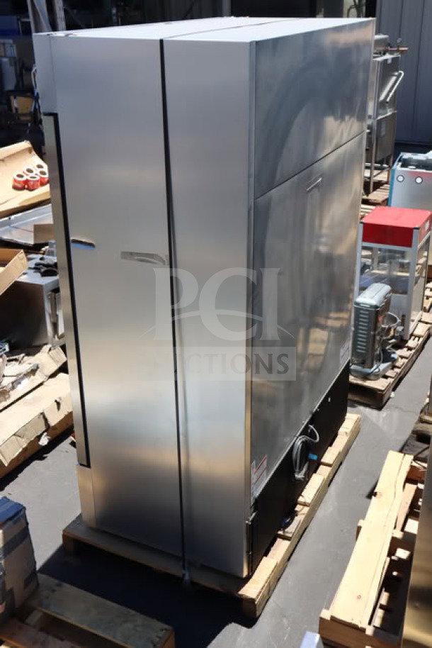 Brand new True T-49DT-HC solid door reach-in combo fridge/freezer, 54 1/8"x29 1/2"x83 3/8", bottom-mounted, tested, scratch-n-dent.