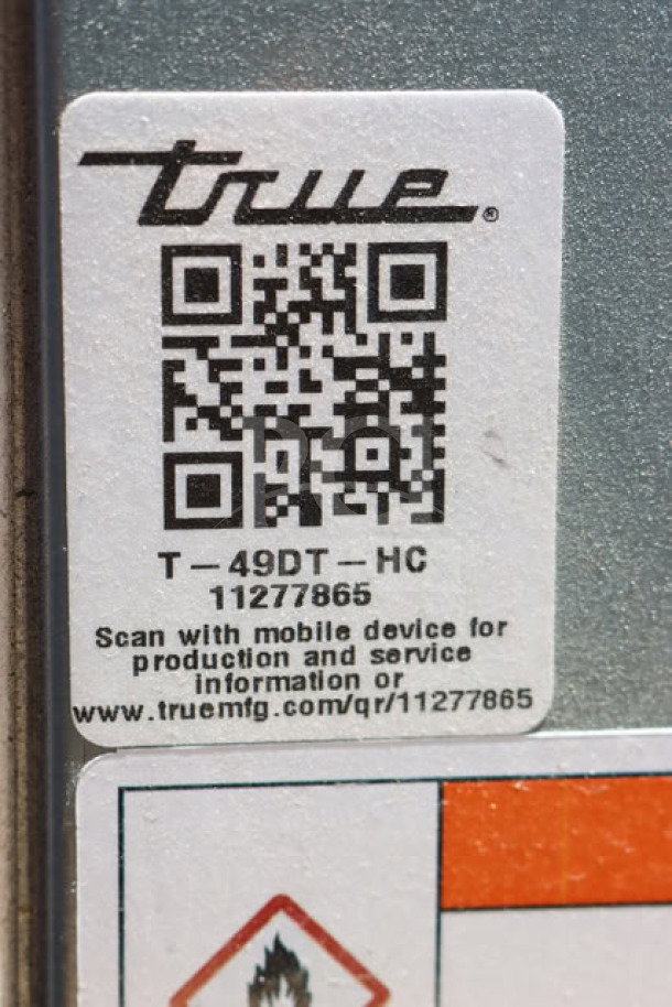 Label on True T-49DT-HC combination refrigerator/freezer showing QR code, model number, and serial number 11277865.