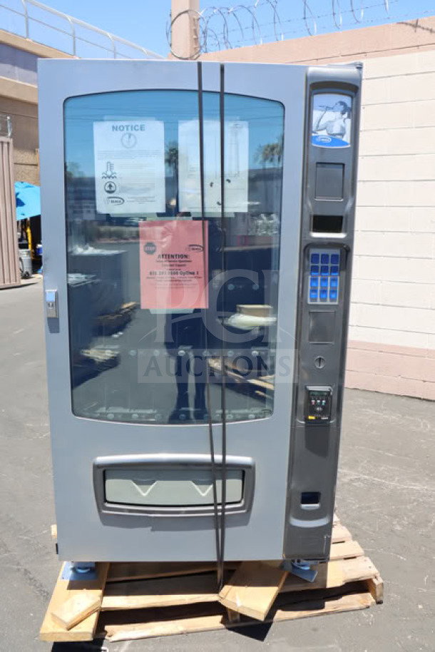 Brand new Seaga ENV5B vending machine, 40-item capacity, refrigerated, scratch-n-dent condition, 115V, 4A, 1 phase.