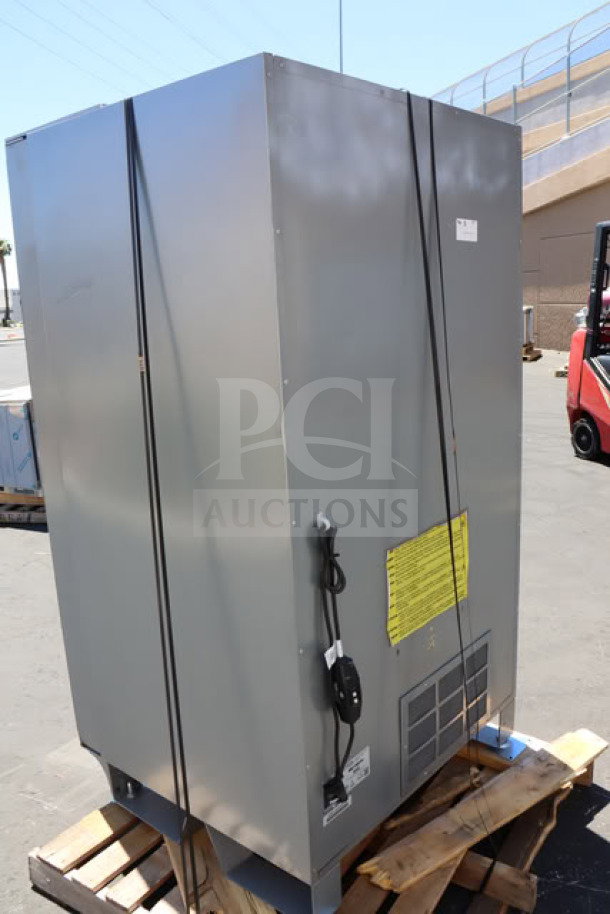 BRAND NEW Seaga ENV5B refrigerated vending machine, 40-item capacity, 115V, scratch-n-dent condition, model label visible.