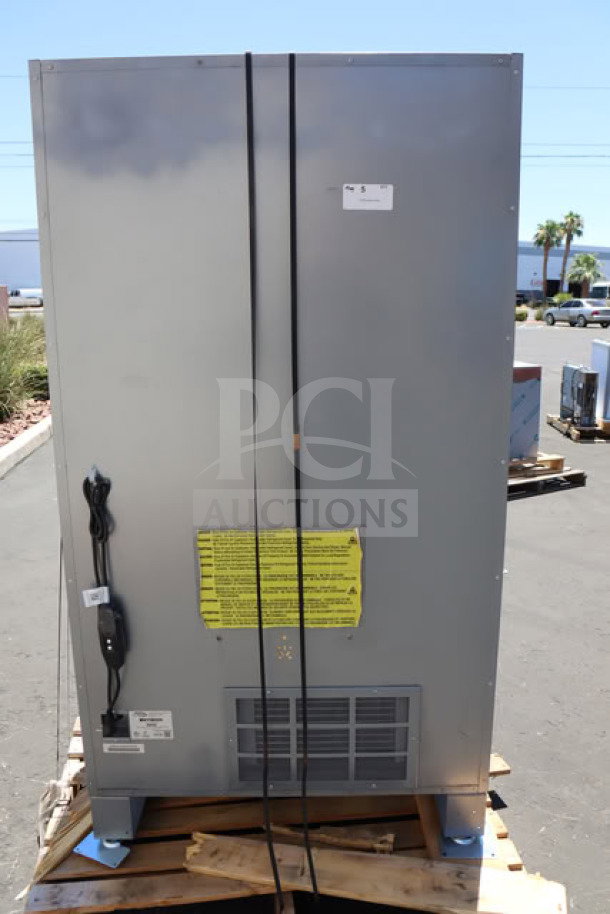 BRAND NEW Seaga ENV5B refrigerated vending machine, 40-item capacity, 115V, visible labels, slight exterior scratch.