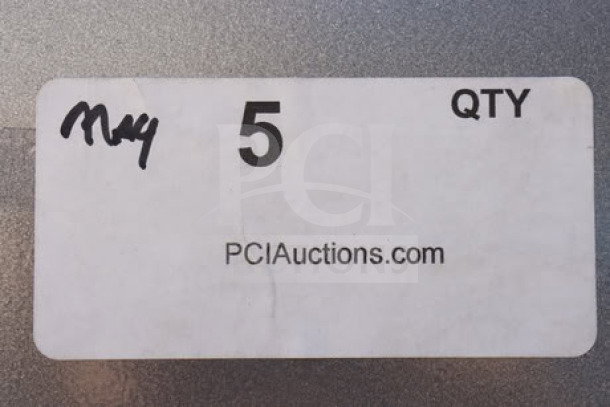 Label on the Seaga ENV5B vending machine shows "PCI Auctions.com" and quantity "5" marked by hand.