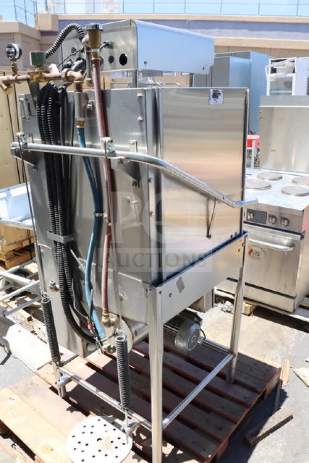 Brand new Jackson TempStar HH-E high hood dishwasher with electric booster, scratches and dents present, 28 5/8"x34 3/8"x76 3/8".