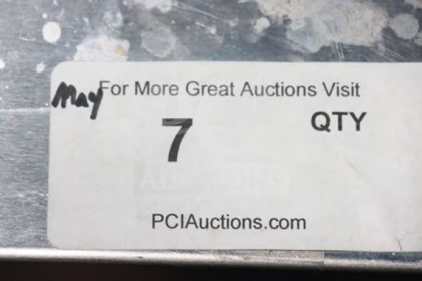 Label from auction website showing "For More Great Auctions Visit PCIAuctions.com," with "7 QTY" marked.