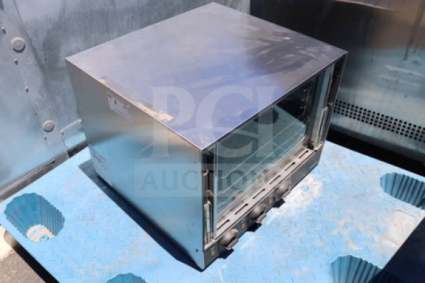 Brand new Vollrath CO4-120HS half-size countertop convection oven. Stainless steel finish, 120V, 1.44 kW, 23"x25"x18".
