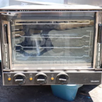 Brand new Vollrath CO4-120HS half-size countertop convection oven, 120V, stainless steel, three racks, controls visible.