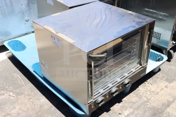 Brand new Vollrath CO4-120HS half-size countertop convection oven, 120V, in scratch-n-dent condition, 23 5/16" x 25 7/16" x 18 7/16".