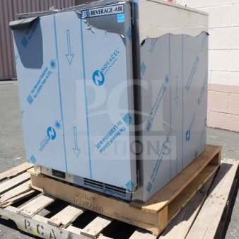 Brand new Beverage-Air UCF24AHC 24" undercounter freezer on wooden pallet, protective film partially intact. Model: UCF24AHC.