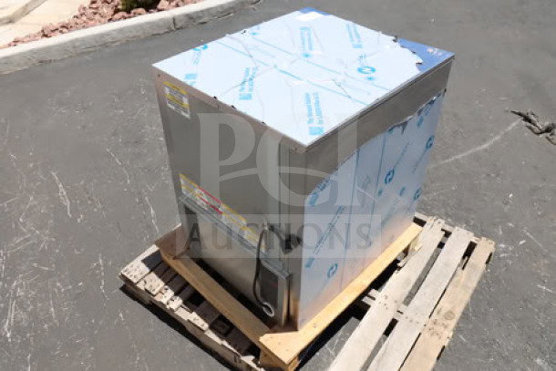 Brand new Beverage-Air UCF24AHC 24" undercounter freezer on pallet, showing protective wrapping and label details.