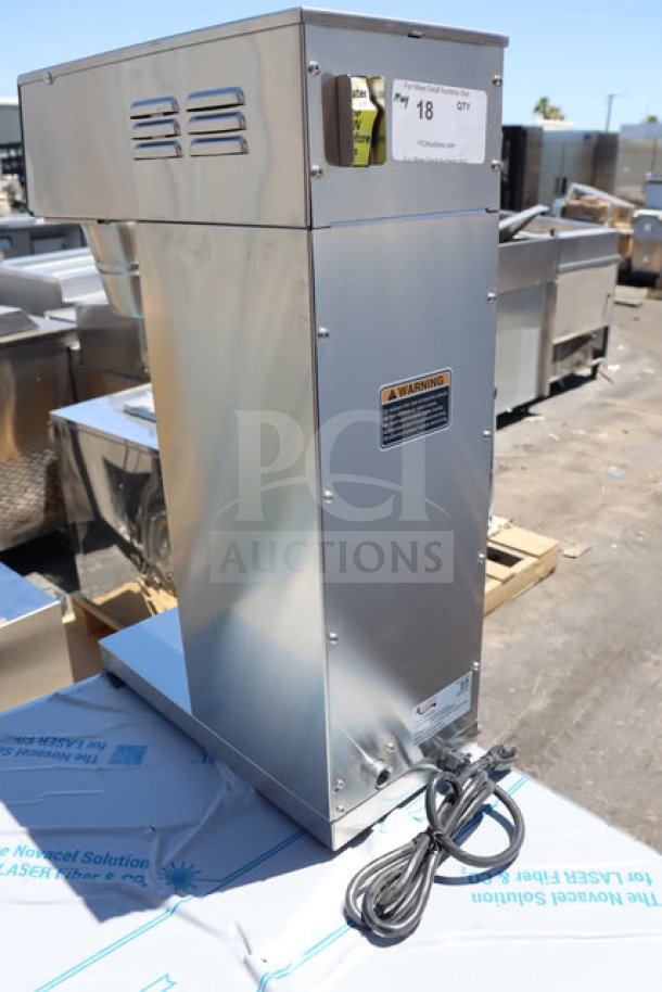 "Brand new Avantco CMADAP Digital Airpot Coffee Maker, stainless steel, minor dents, warning label visible, power cord included."