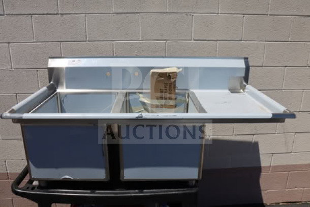 Regency 2-bowl sink, model 600S2182418R, new out of box, 16 gauge, 18" x 24" x 14" bowls, 18" right drainboard.