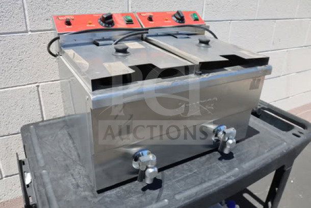 Brand new Avantco F202 dual tank countertop fryer, 30 lb. capacity, 208-240V, 5400/7200W, minor scratches visible.