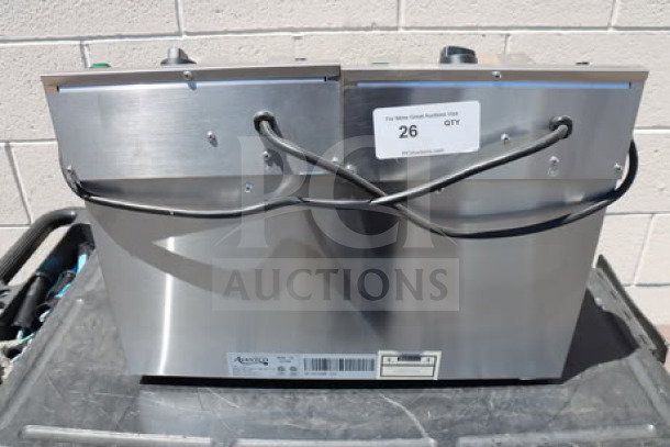 Brand new Avantco F202 30 lb. dual tank electric fryer, 208-240V, 5400/7200W, medium-duty, visible label with serial number.