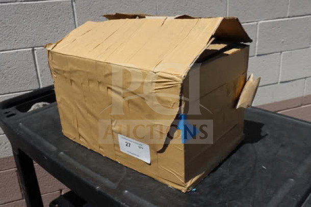 Damaged box containing a brand new Estella 348PSM56MTR 4 hp motor for SM50 and SM60 mixers, label visible.