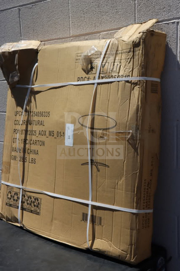 Brand new cocktail table in damaged box. Packaging displays product details and shipping information.