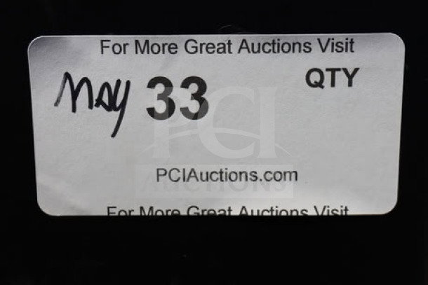 Sticker label with "May 33" and "QTY" printed on it. Displays "PCIAuctions.com", indicating auction website.