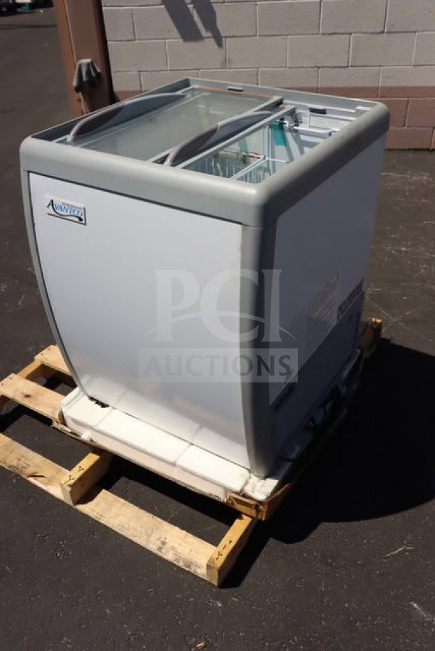 Brand new Avantco DFF6-HCL ice cream freezer, 26 3/16" wide, customizable flat top, minor scratches, model visible on label.