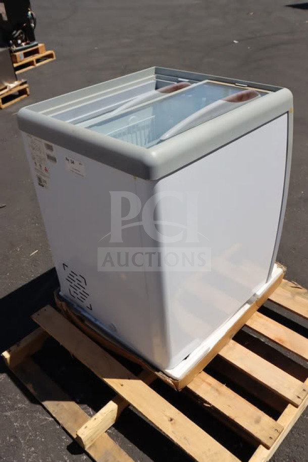 Brand new Avantco DFF6-HCL ice cream freezer, 26" customizable flat top, 115V, shown on a pallet.