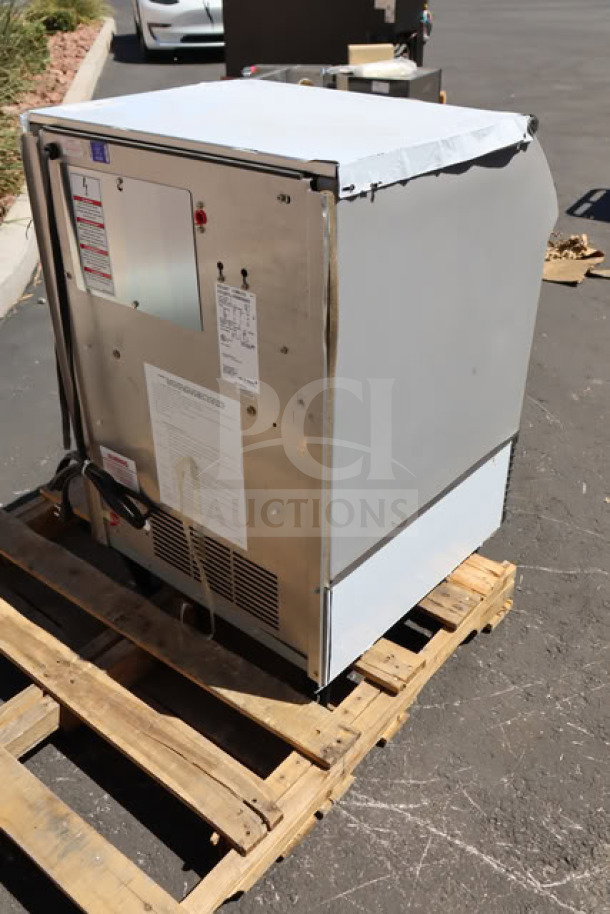 Brand new Ice-O-Matic ICEU220FA undercounter ice machine, air-cooled, full dice cubes, 238 lb capacity, minor scratches.