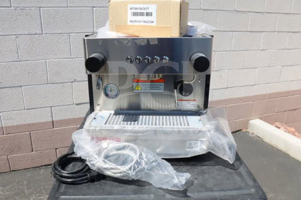 Brand new Estella Caffe ECEM1C one group compact automatic espresso machine, 110V, in scratch-n-dent condition.