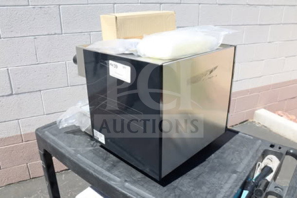 Brand new Estella Caffe ECEM1C espresso machine, compact automatic, 110V, scratch-n-dent condition.