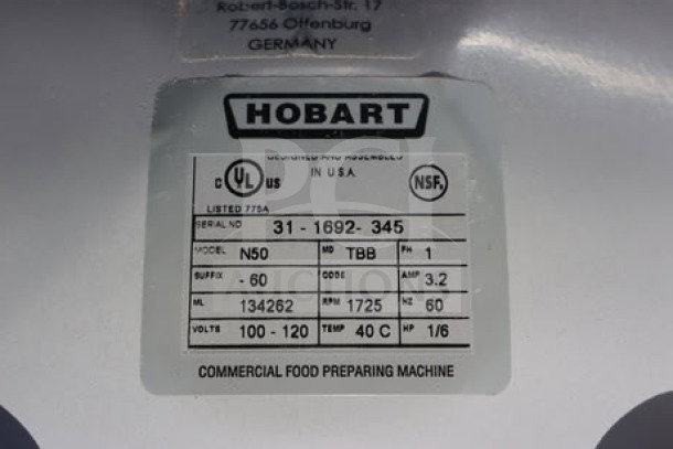Label close-up of Hobart N50-60 mixer, serial 31-1692-345, showing power, voltage, and certification details.