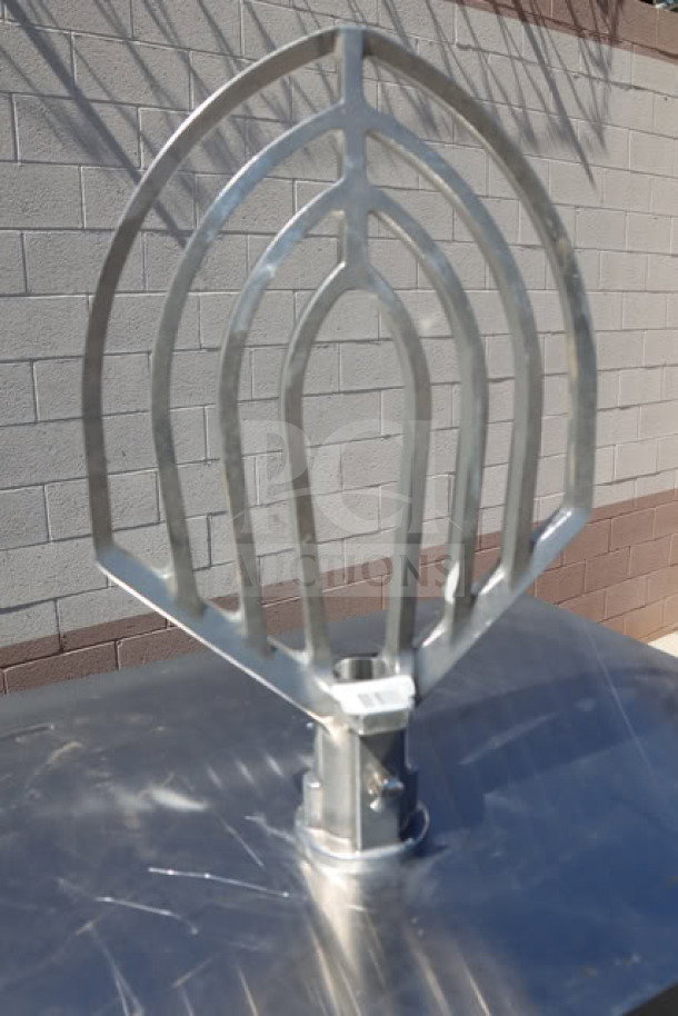 Brand new Hobart 00-874654 beater paddle, stainless steel, pristine condition, for commercial mixers.