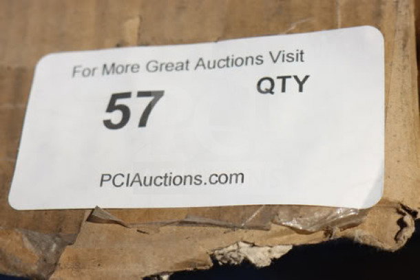 Cardboard box label for PCI Auctions, showing quantity number 57. Shipping info visible on worn packaging.