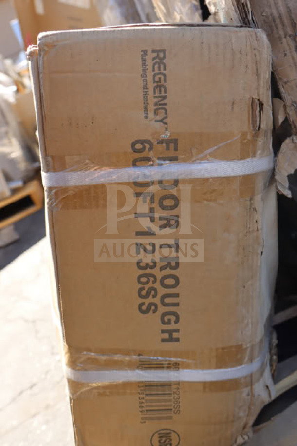 Regency 600FT1236SS 12"x36" stainless steel floor trough with grate, new in box, minor outer box damage visible.