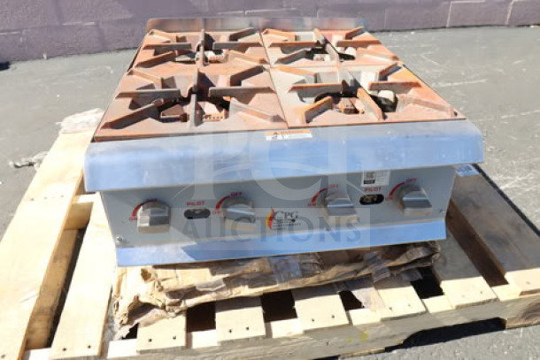 Cooking Performance Group R-CPG-24-NL gas hot plate, 4 burners, 88,000 BTU, surface rust, brand new, scratch-n-dent condition.