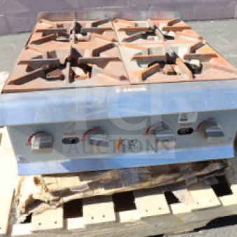 Cooking Performance Group R-CPG-24-NL gas hot plate, 4 burners, 88,000 BTU, surface rust, brand new, scratch-n-dent condition.