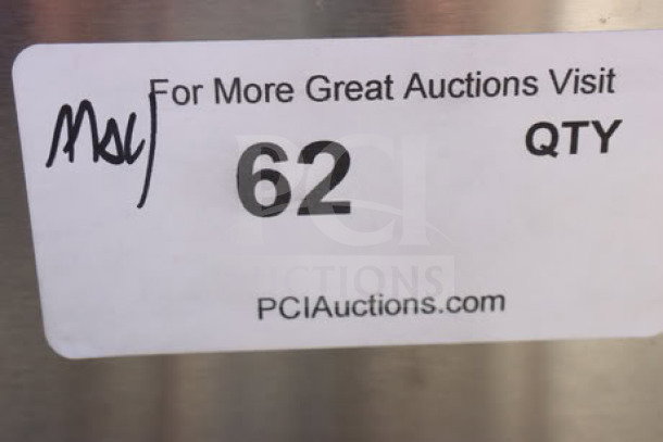 Sticker label showing "For More Great Auctions Visit PCIAuctions.com, 62 QTY" with handwritten initials.