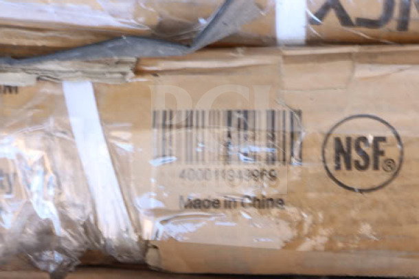 Cardboard packaging with barcode, "Made in China," and NSF label for a "Worktable." Box is taped and slightly worn.
