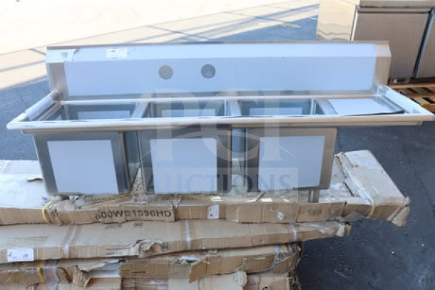 Brand new Regency 600S3151515R 66.5" three-compartment commercial sink with stainless steel legs and 15" right drainboard.