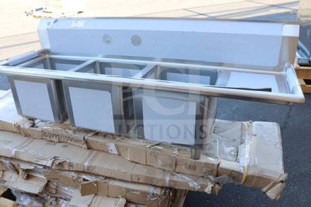 Regency 600S3151515R three-compartment stainless steel sink with right drainboard. Brand new, scratch-n-dent condition.