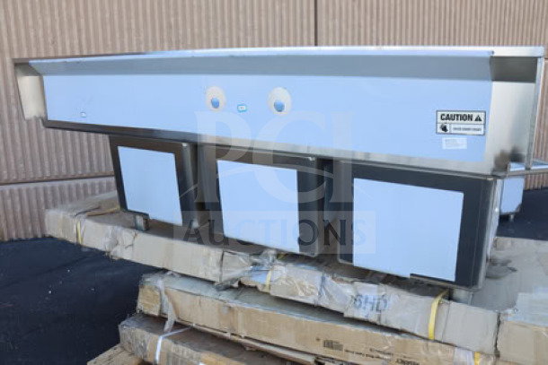 Regency 600S3151515R three-compartment commercial sink with stainless steel legs and right drainboard. Scratch-n-dent condition.