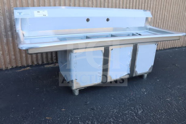 Steelton 522CS31014LR 54" three compartment commercial sink with two 12" drainboards, new scratch-and-dent condition.